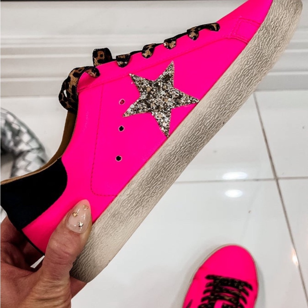 Brand New NEVER removed from box Comes with Leopard shoe laces!! Soo cute